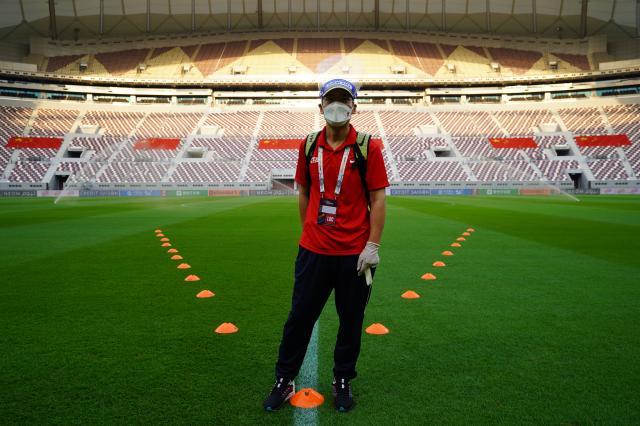 1640937201410026375.jpg 11-在多哈出战日本队之前的赛场内.jpg